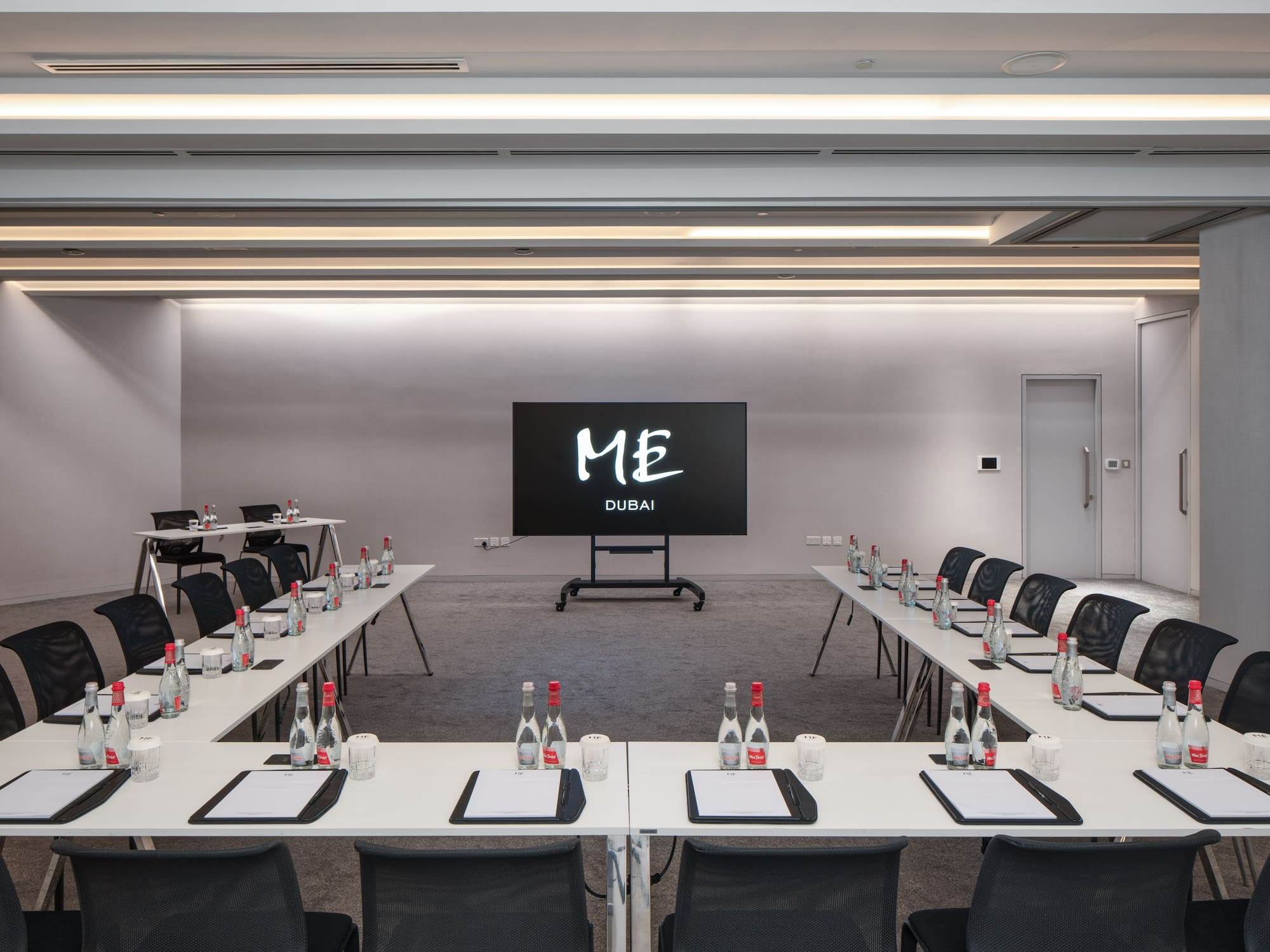 a room with tables and chairs