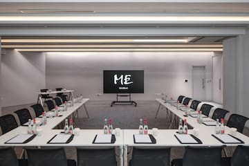 a room with tables and chairs