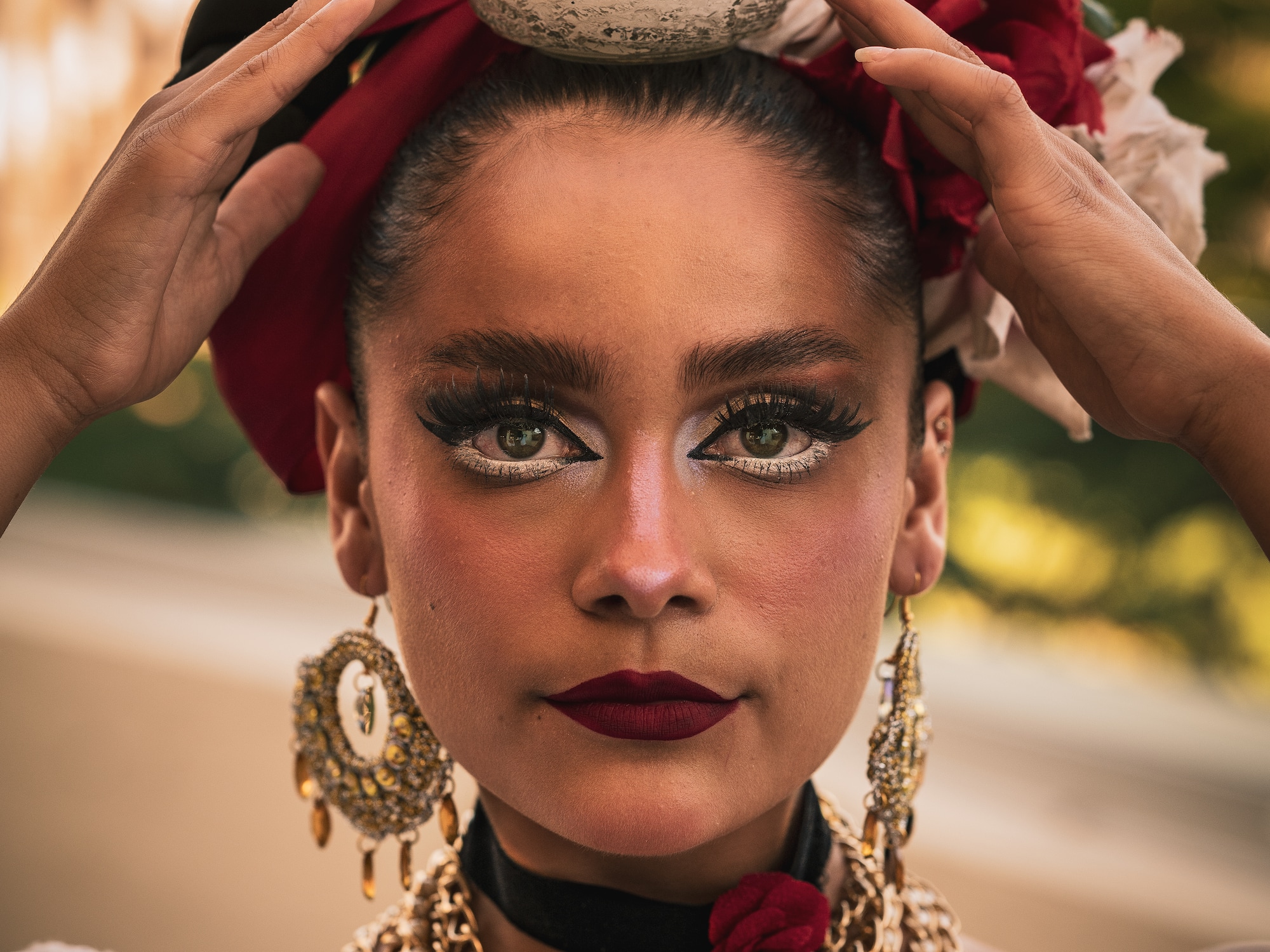 a woman with a vase on her head
