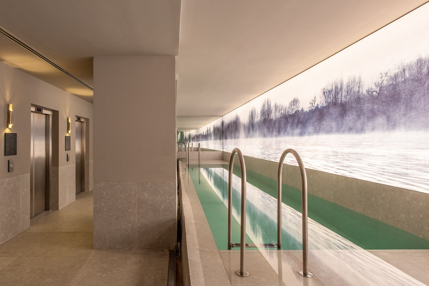 a pool with a view of the water