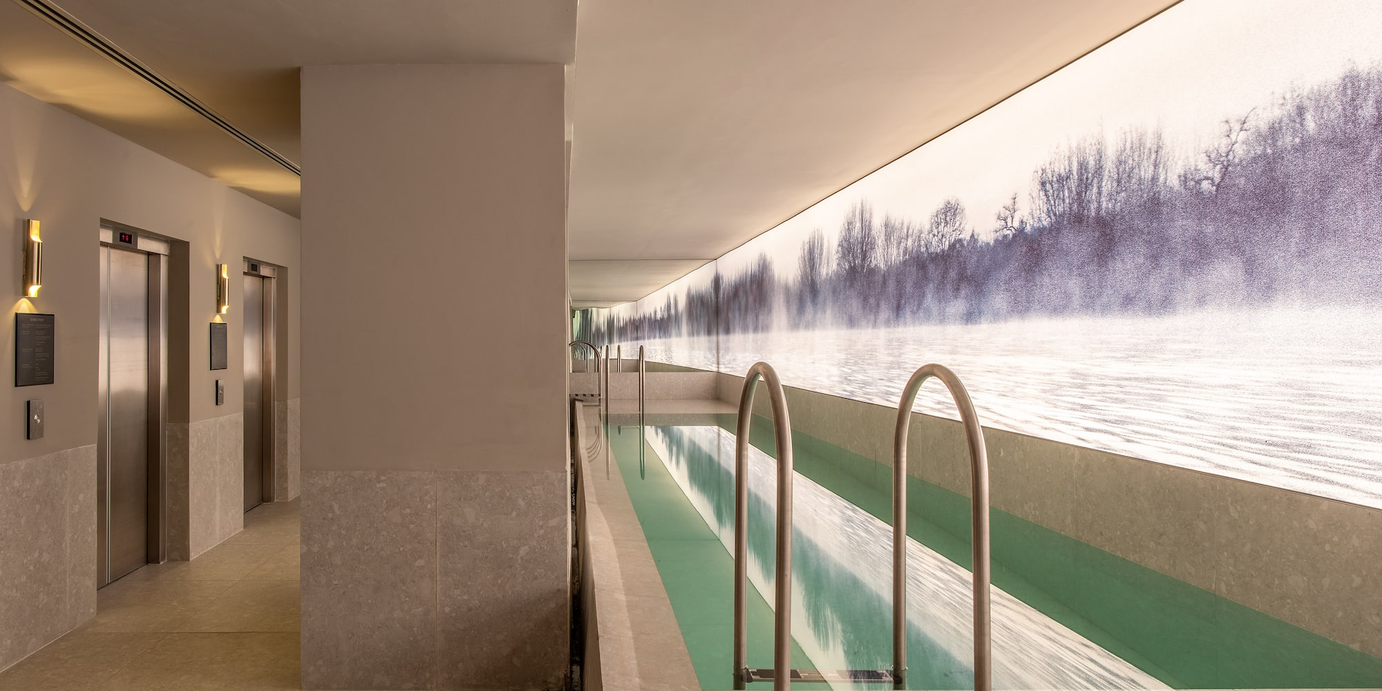 a pool with a view of the water