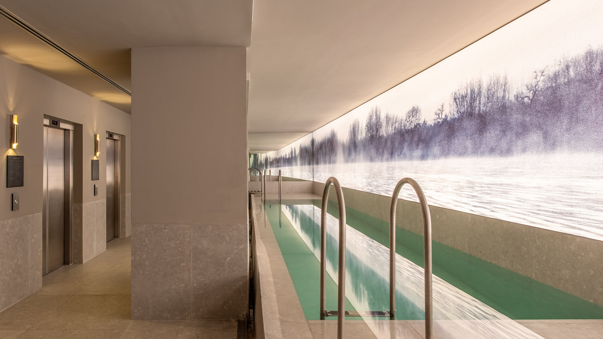 a pool with a view of the water