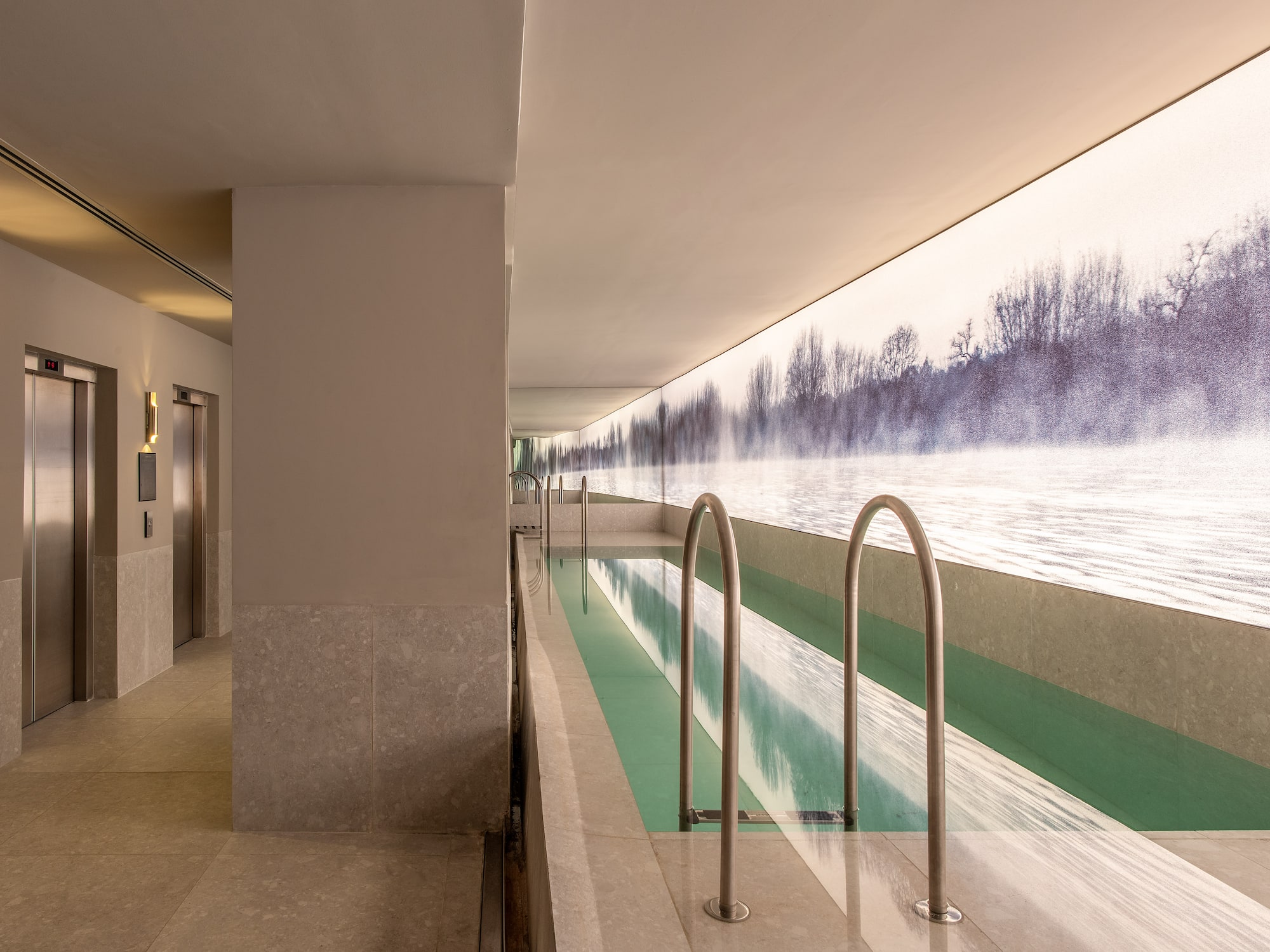 a pool with a view of the water