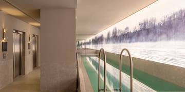 a pool with a view of the water