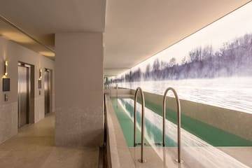 a pool with a view of the water