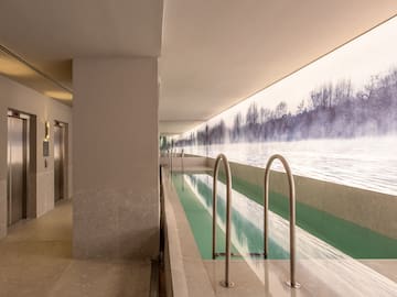 a pool with a view of the water