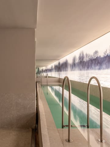 a pool with a view of the water