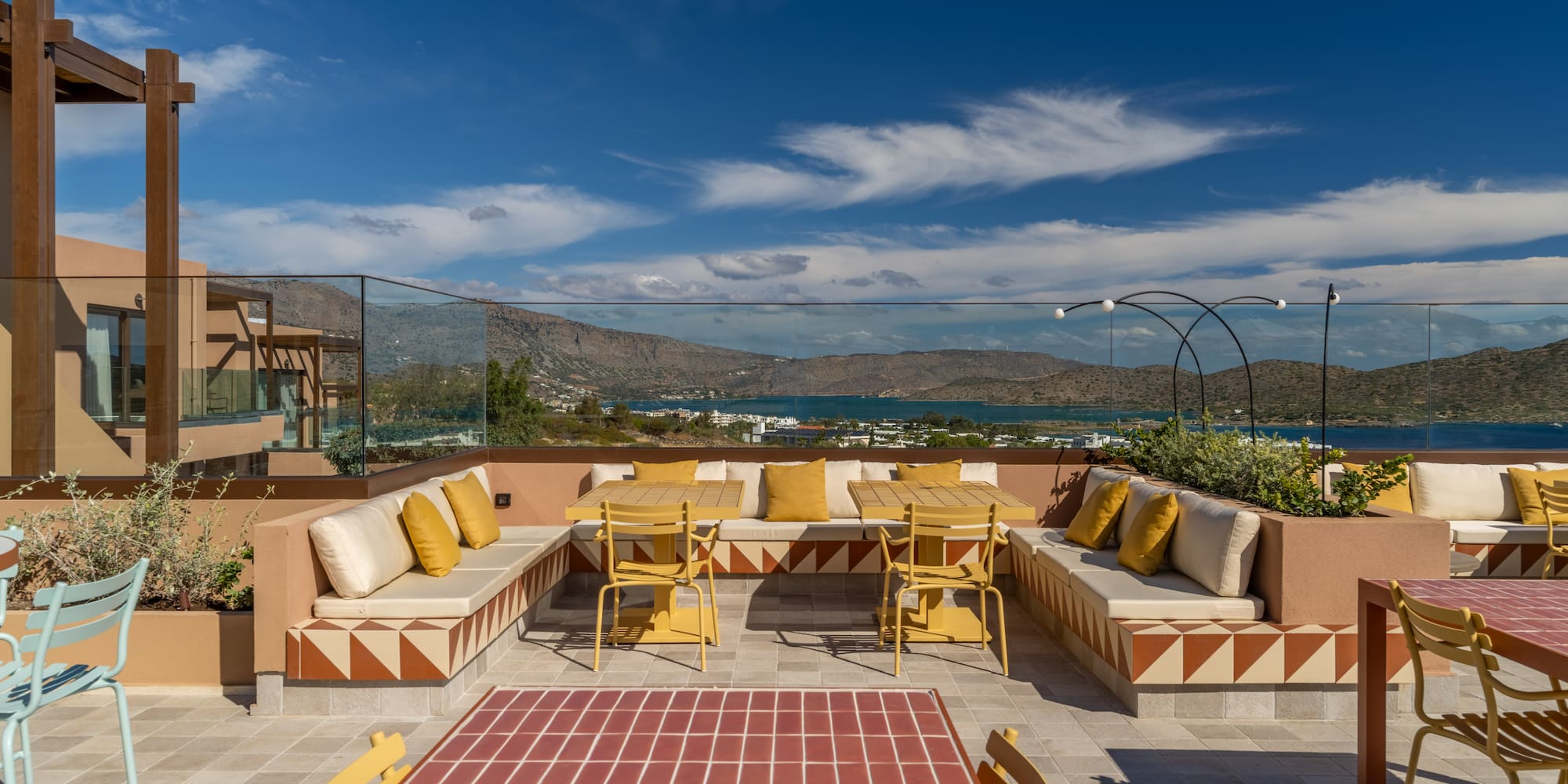 a patio with a table and chairs