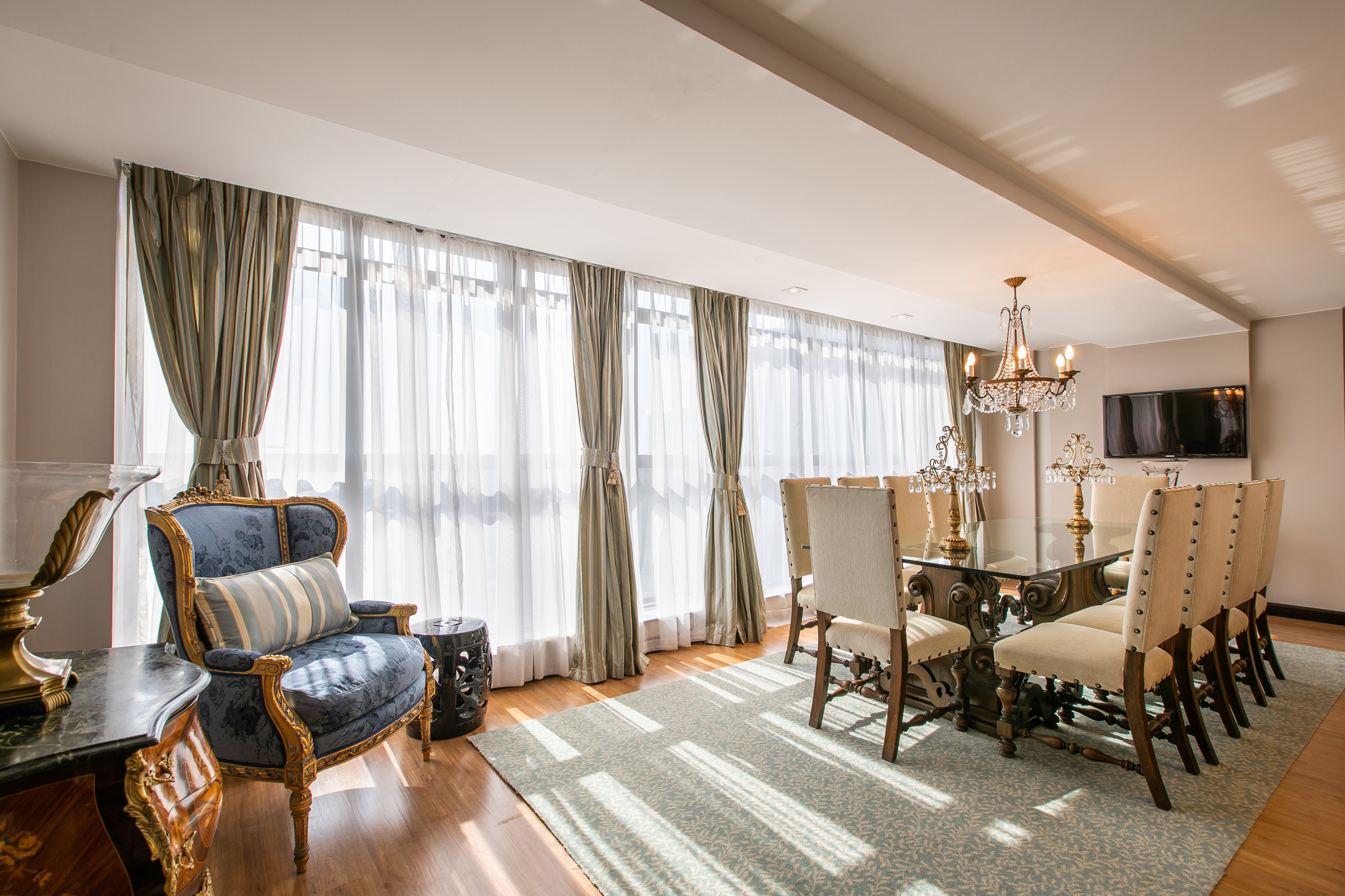 a room with a table and chairs