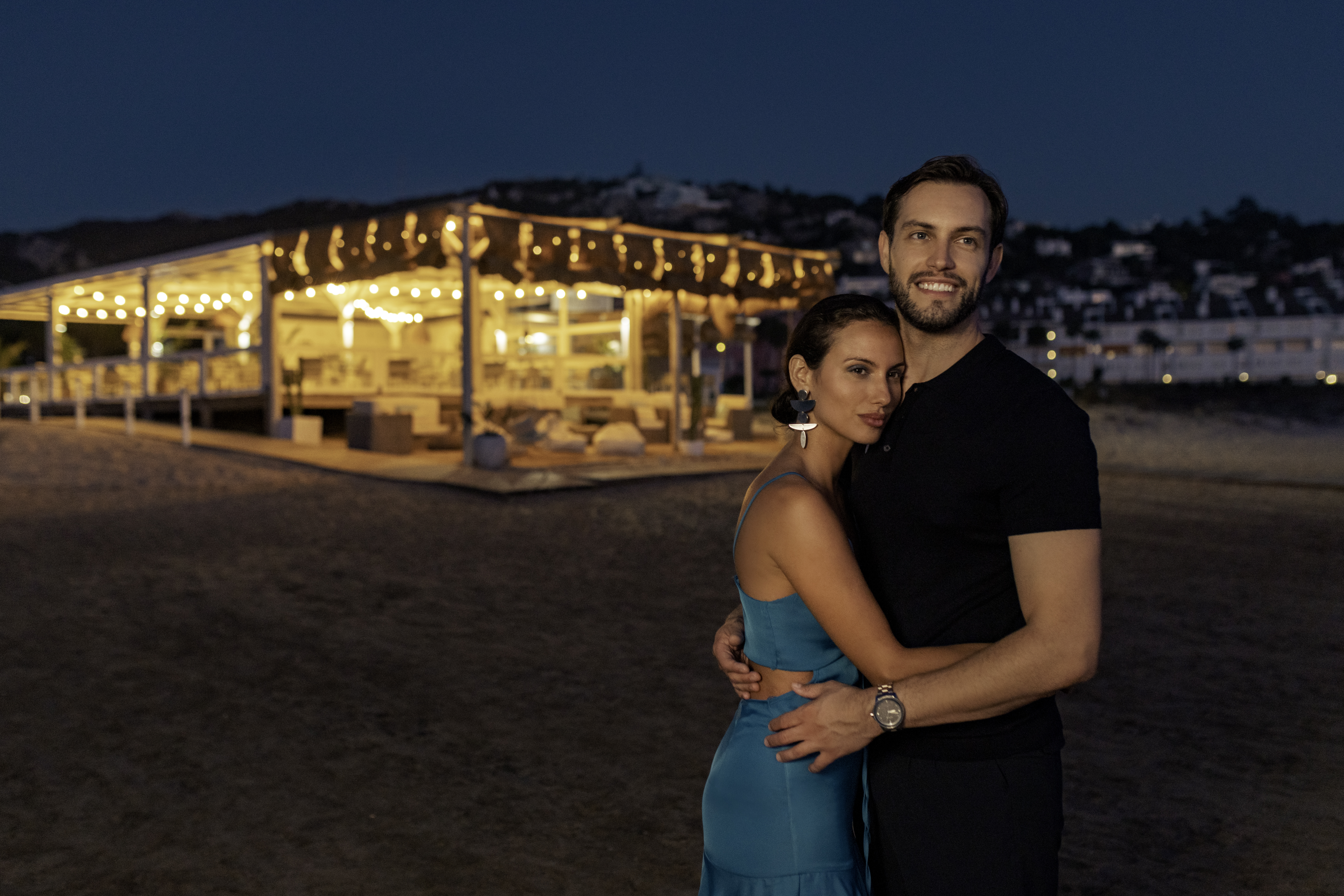 a man and woman posing for a picture