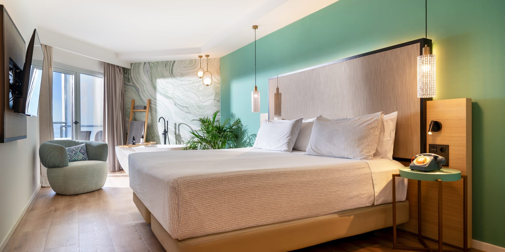 a room with a bed and a chair