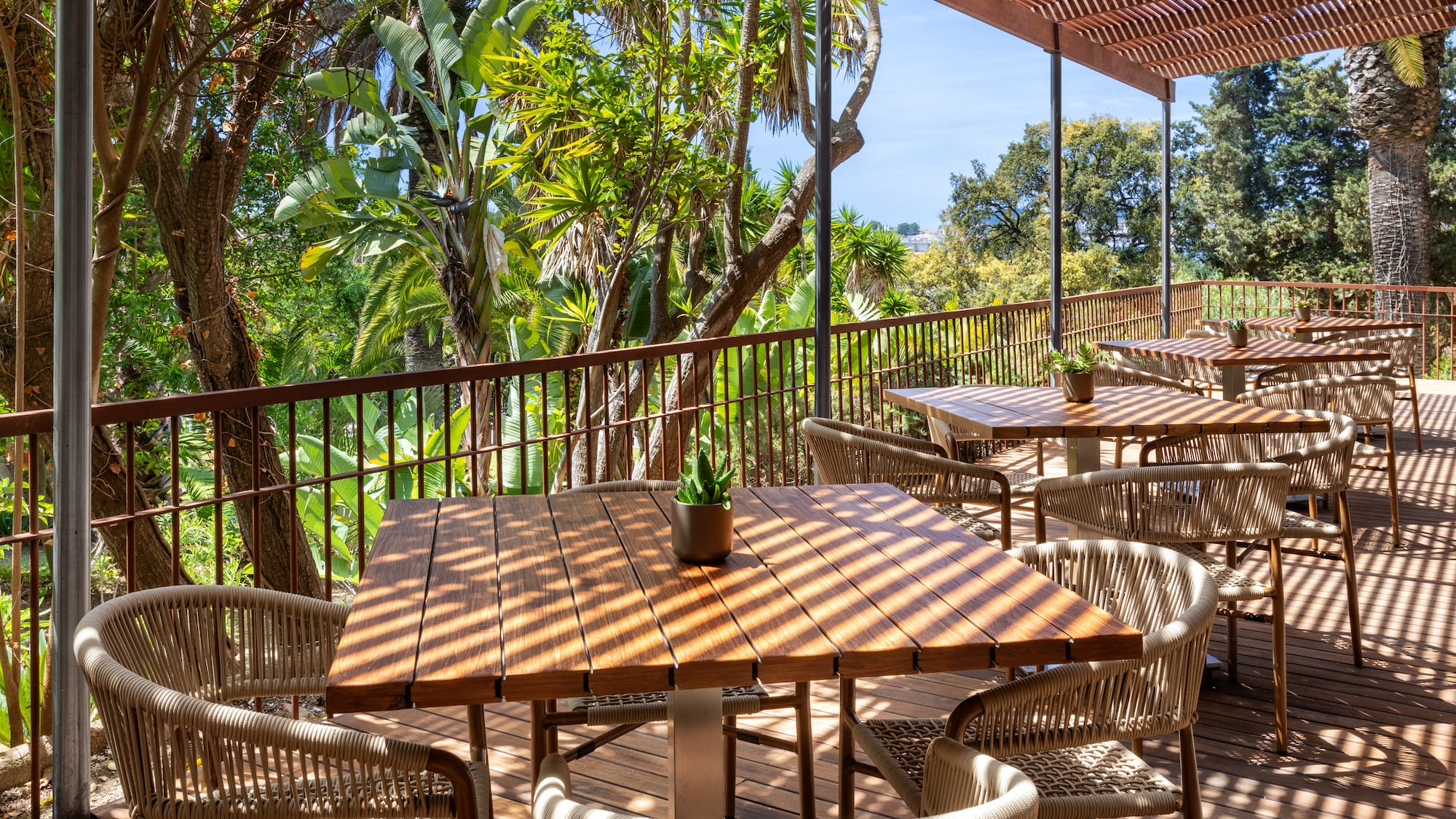a table and chairs on a deck