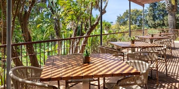 a table and chairs on a deck