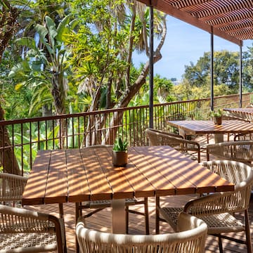 a table and chairs on a deck