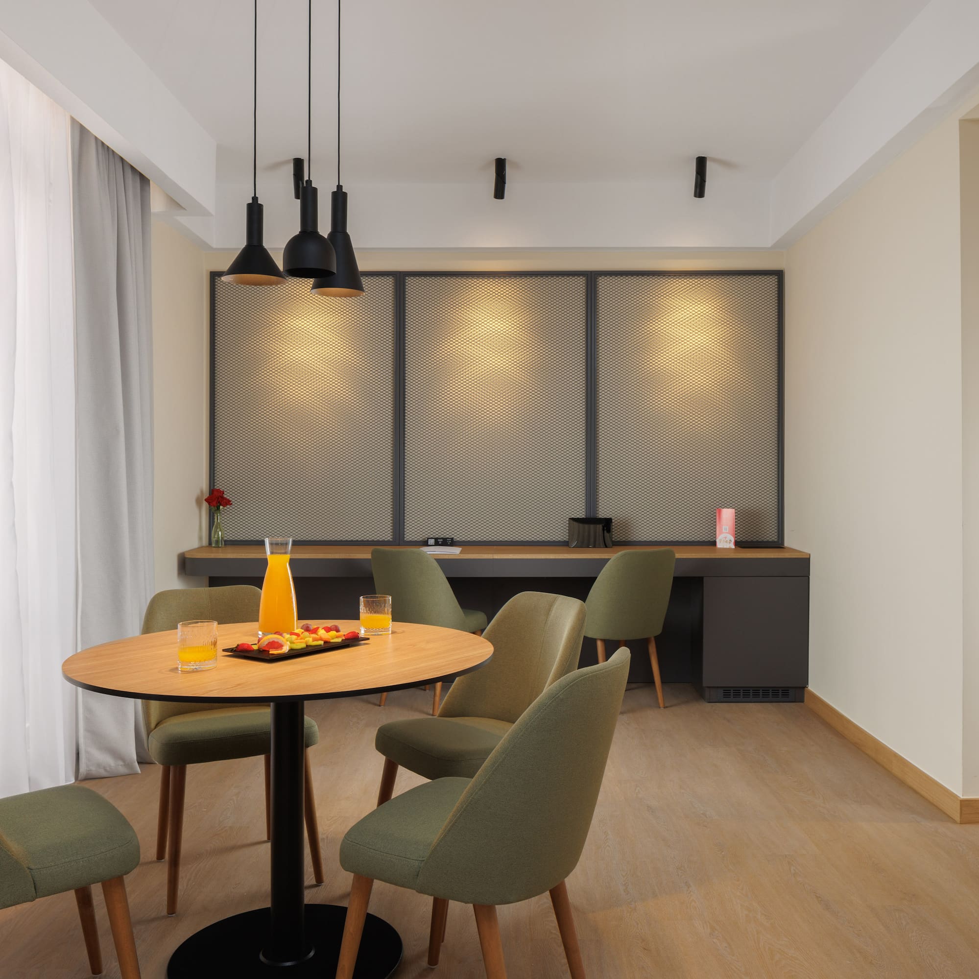 a room with a table and chairs