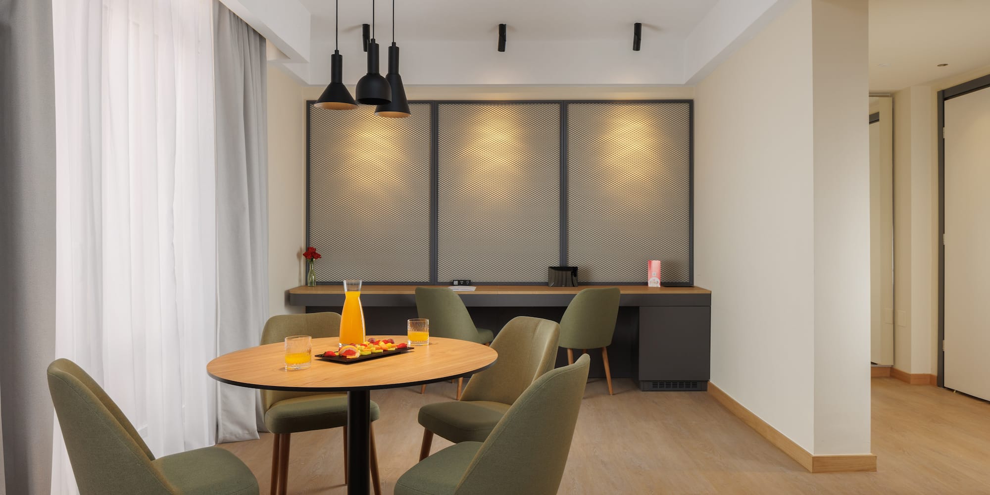 a room with a table and chairs