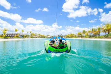 people on a tube in the water