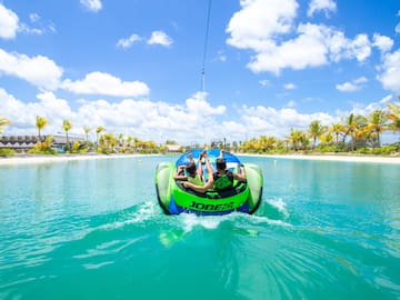 people on a tube in the water