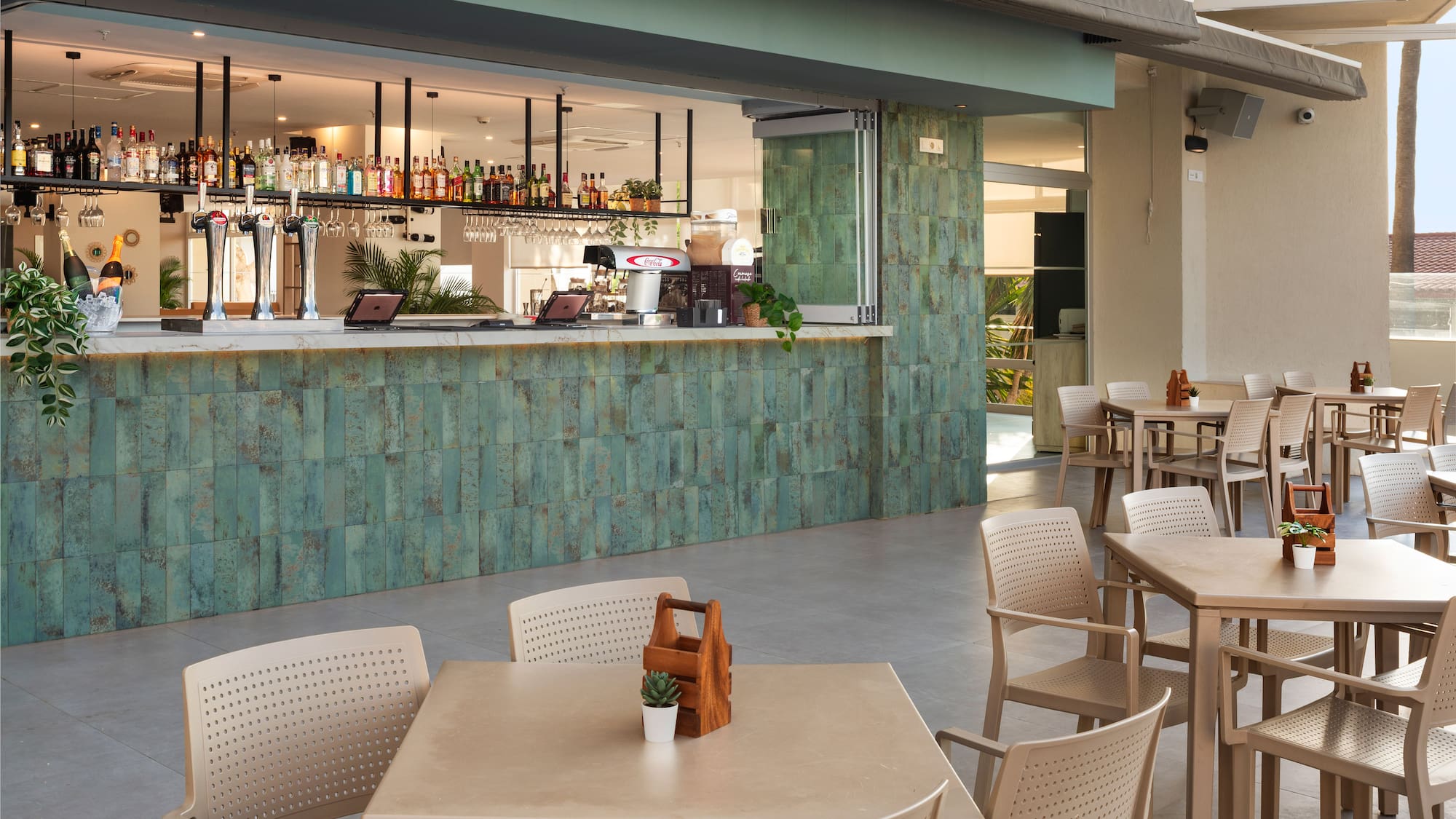 a restaurant with tables and chairs