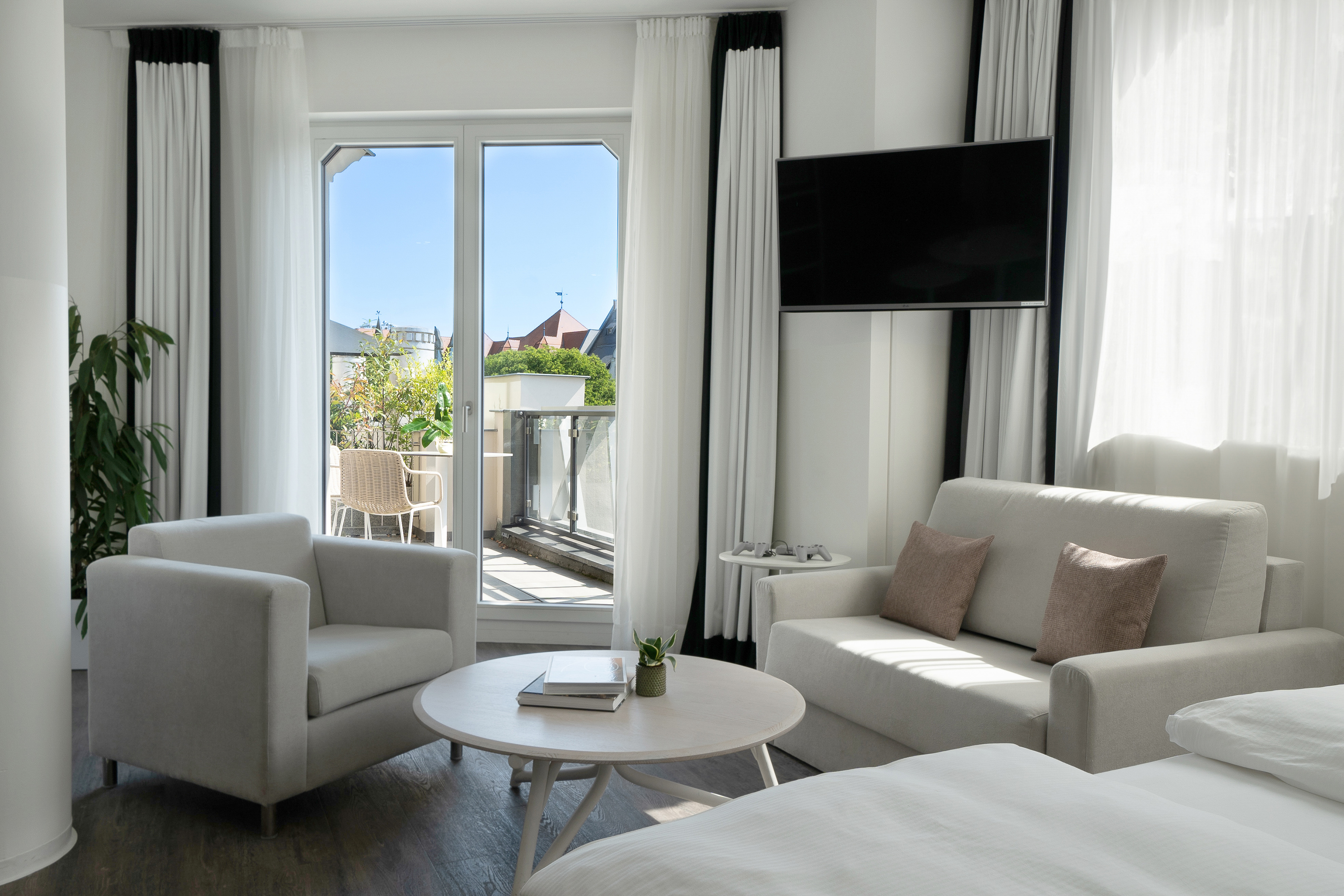 a room with a television and a couch