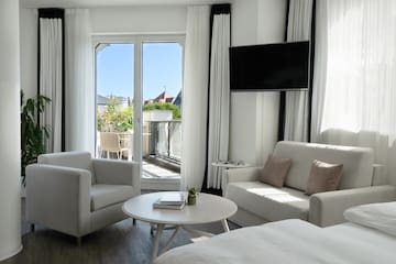 a room with a television and a couch