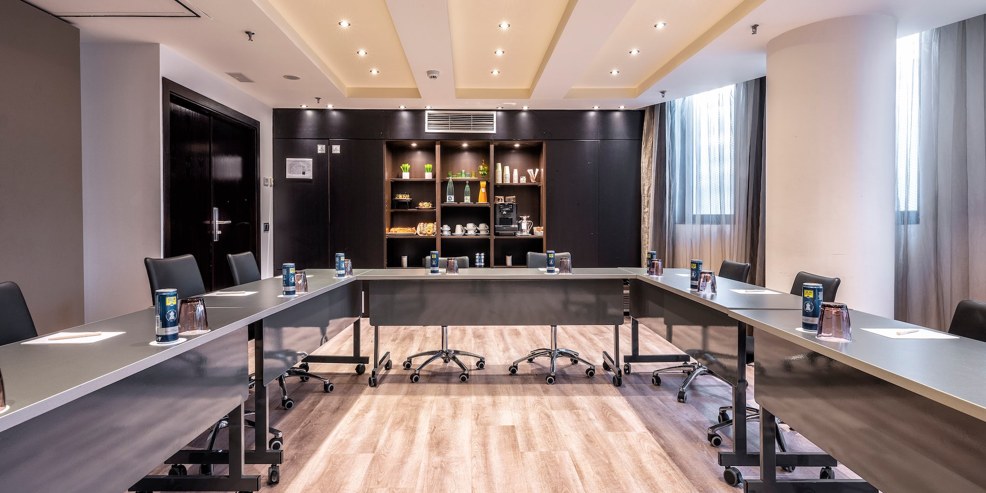 a room with a table and chairs