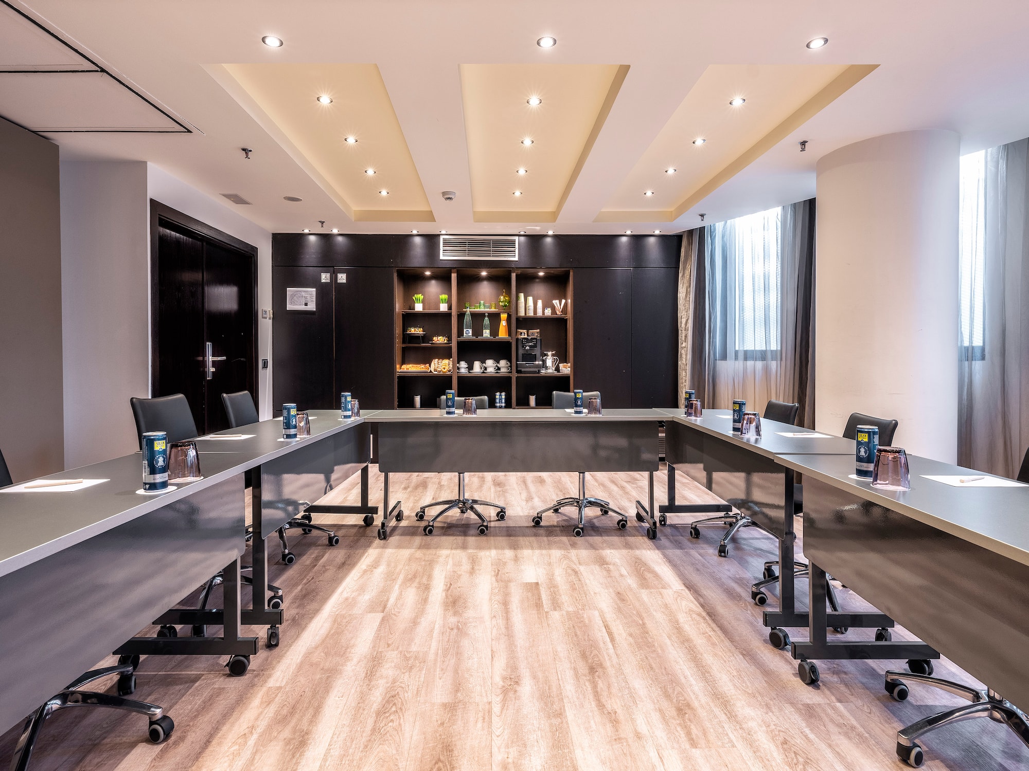 a room with a table and chairs