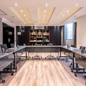 a room with a table and chairs