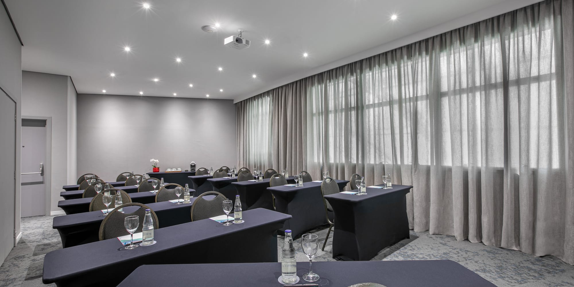 a room with tables and chairs