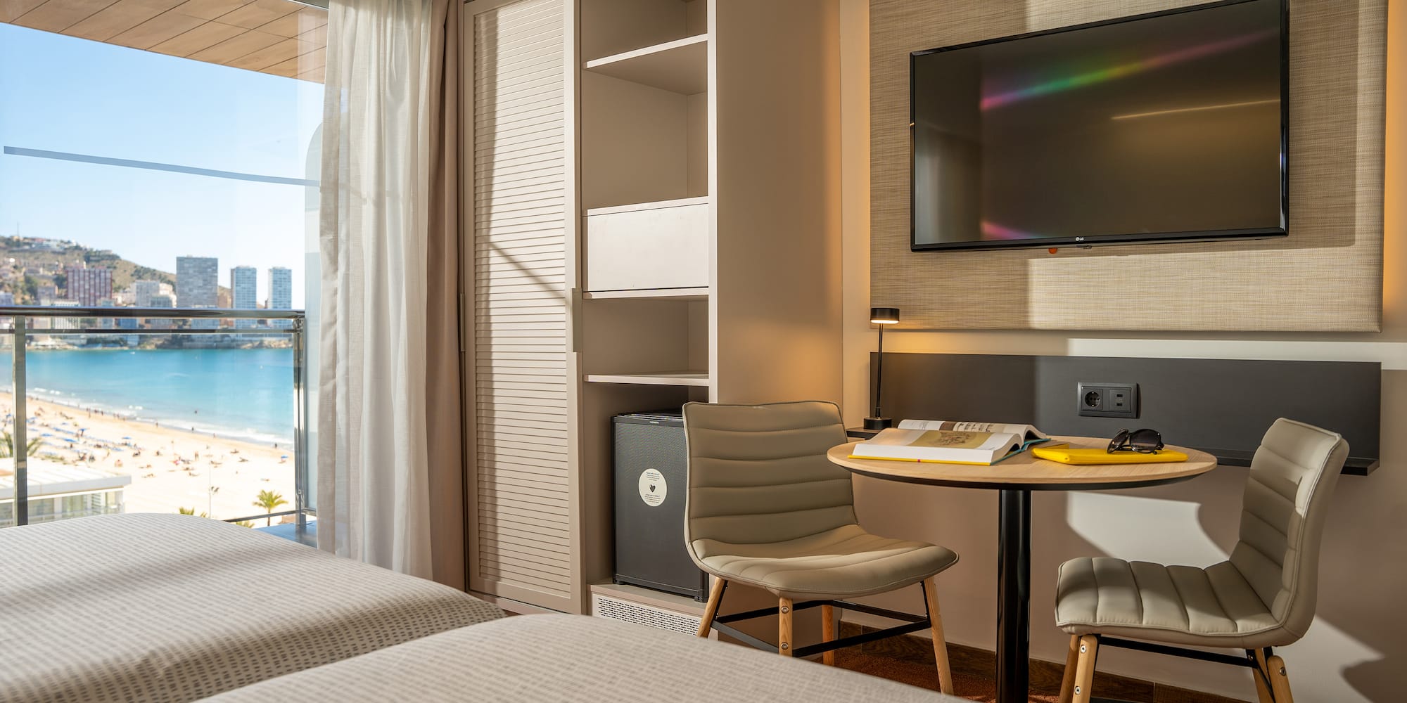 a room with a television and a table