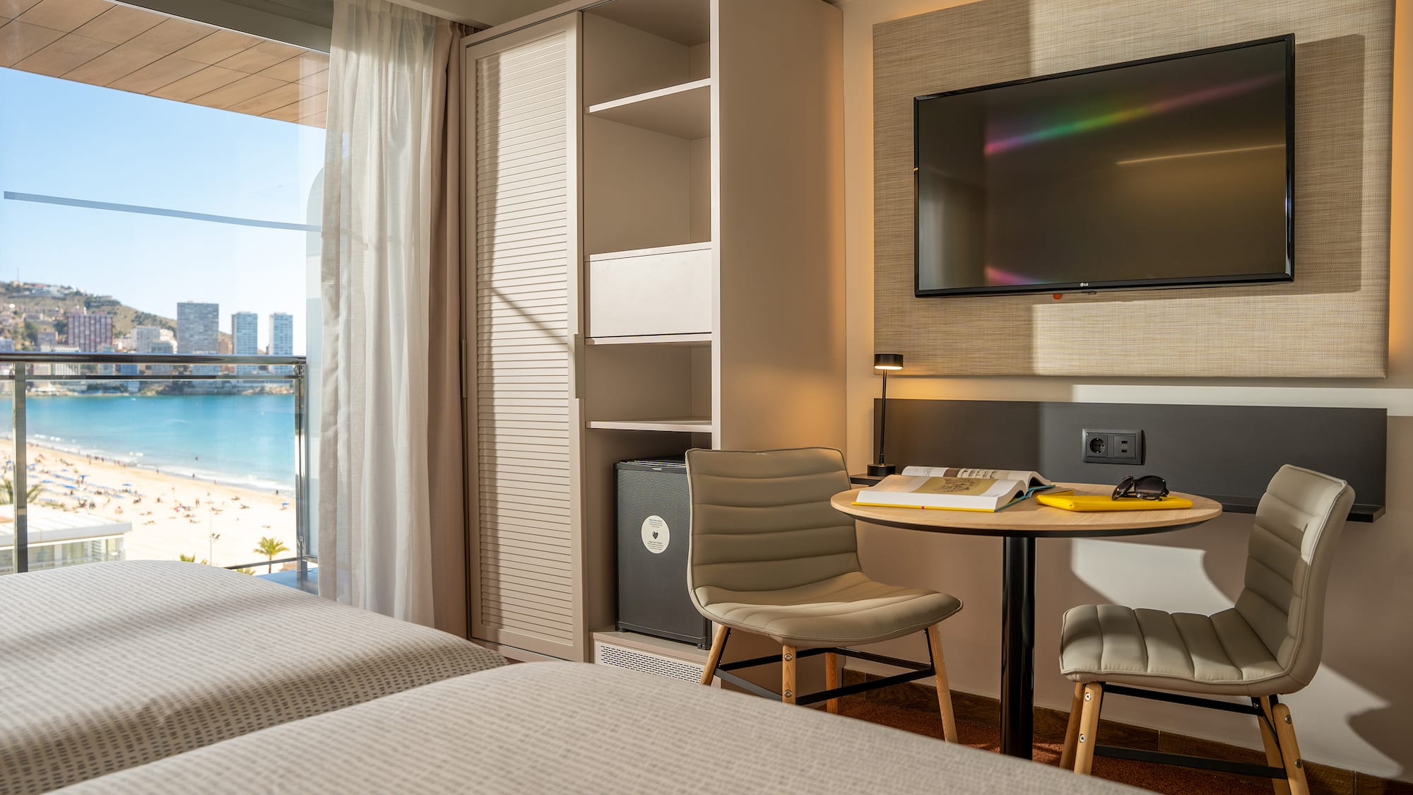 a room with a television and a table