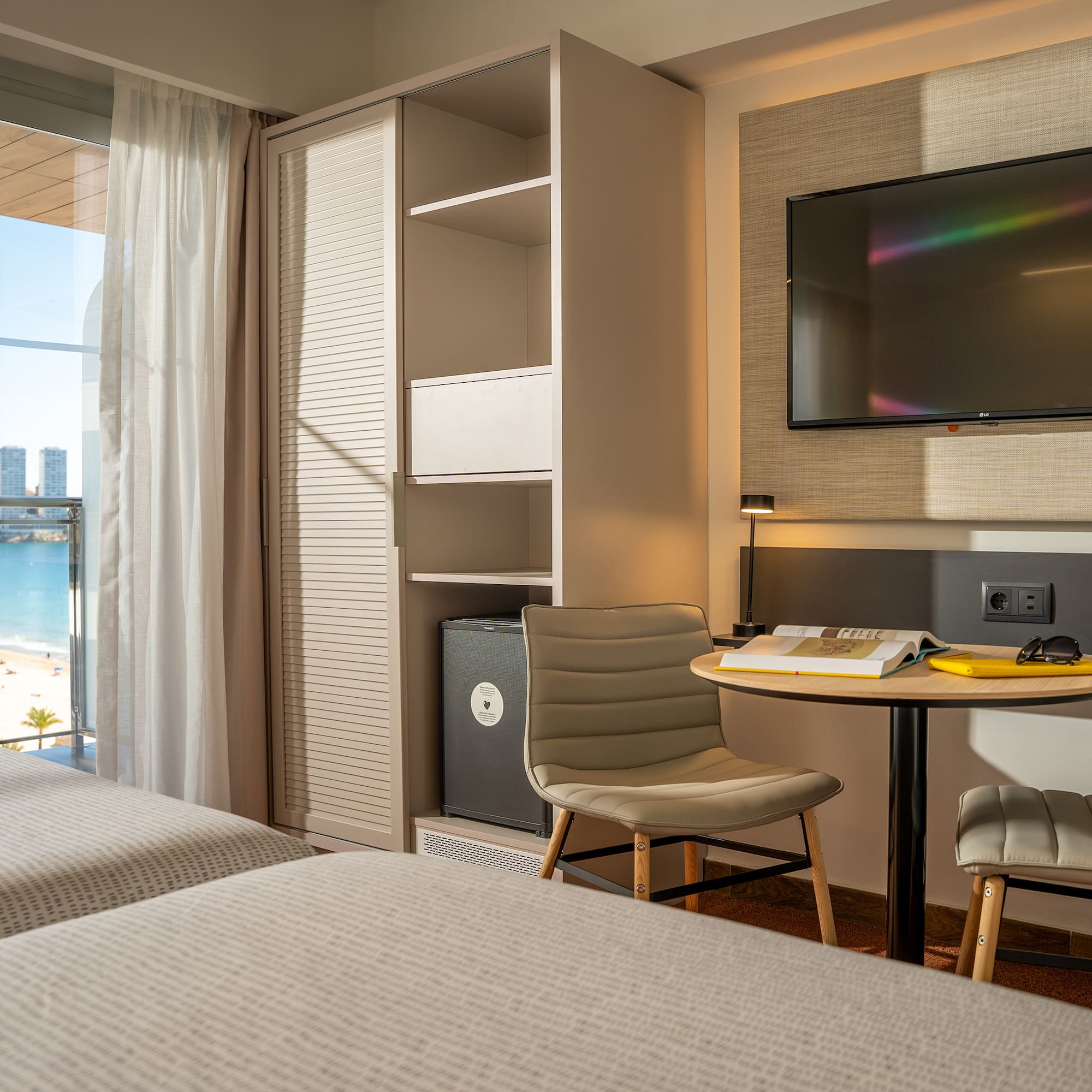 a room with a television and a table