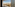 Panoramic Paris hotel view with Eiffel Tower, Seine River, cityscape.