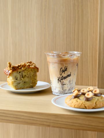 a plate of food and a drink on a table