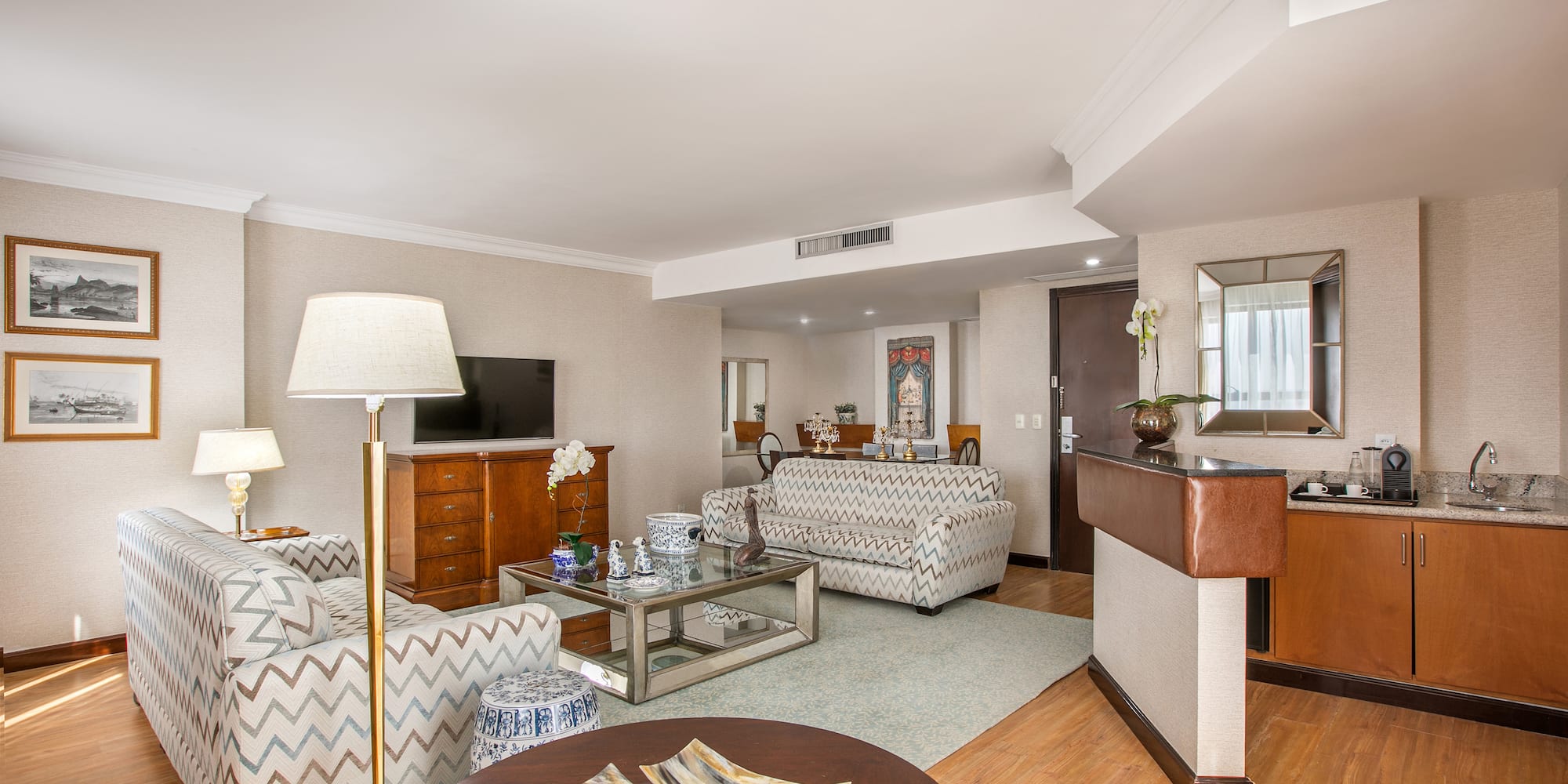 a living room with couches and a table