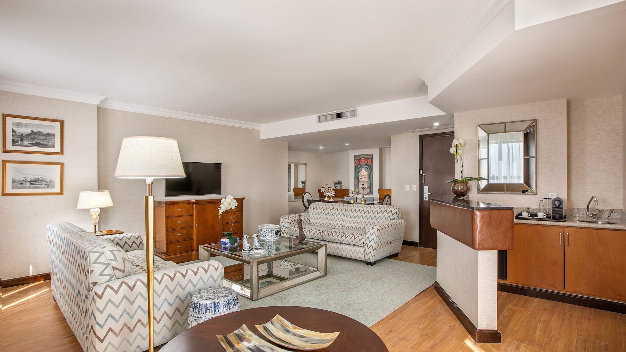 a living room with couches and a table