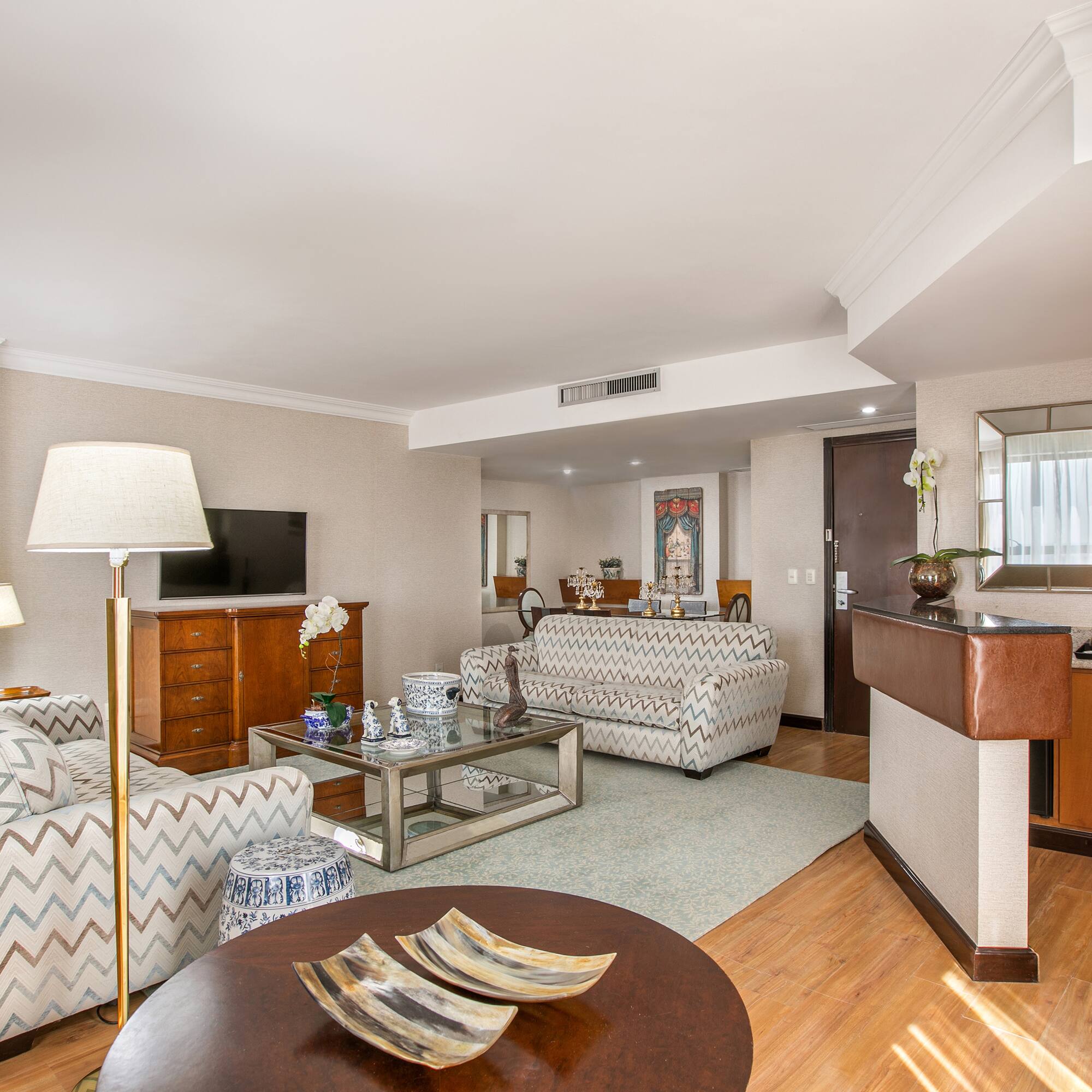 a living room with couches and a table