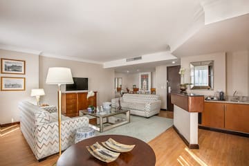 a living room with couches and a table
