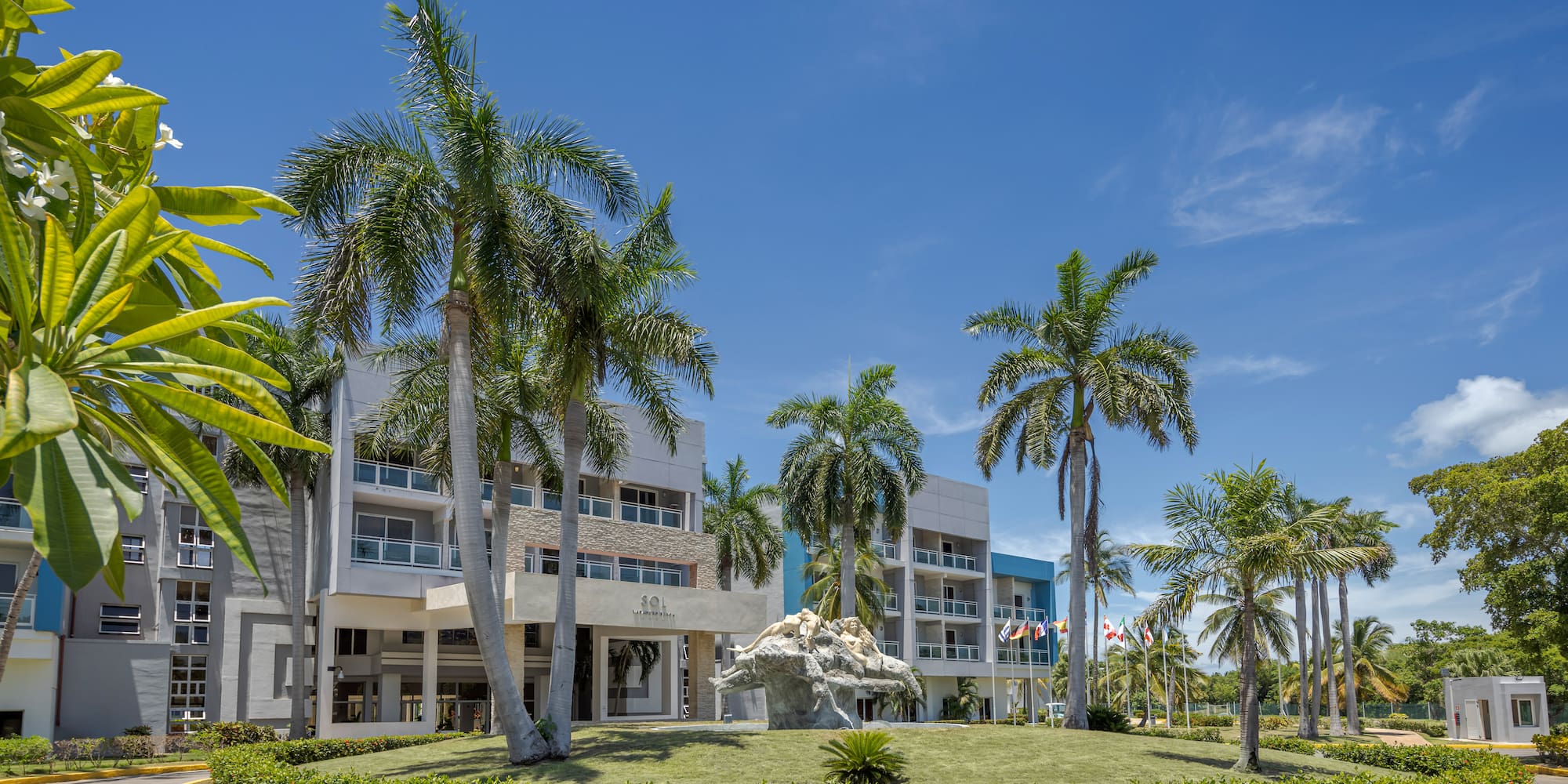 a palm trees in front of a building