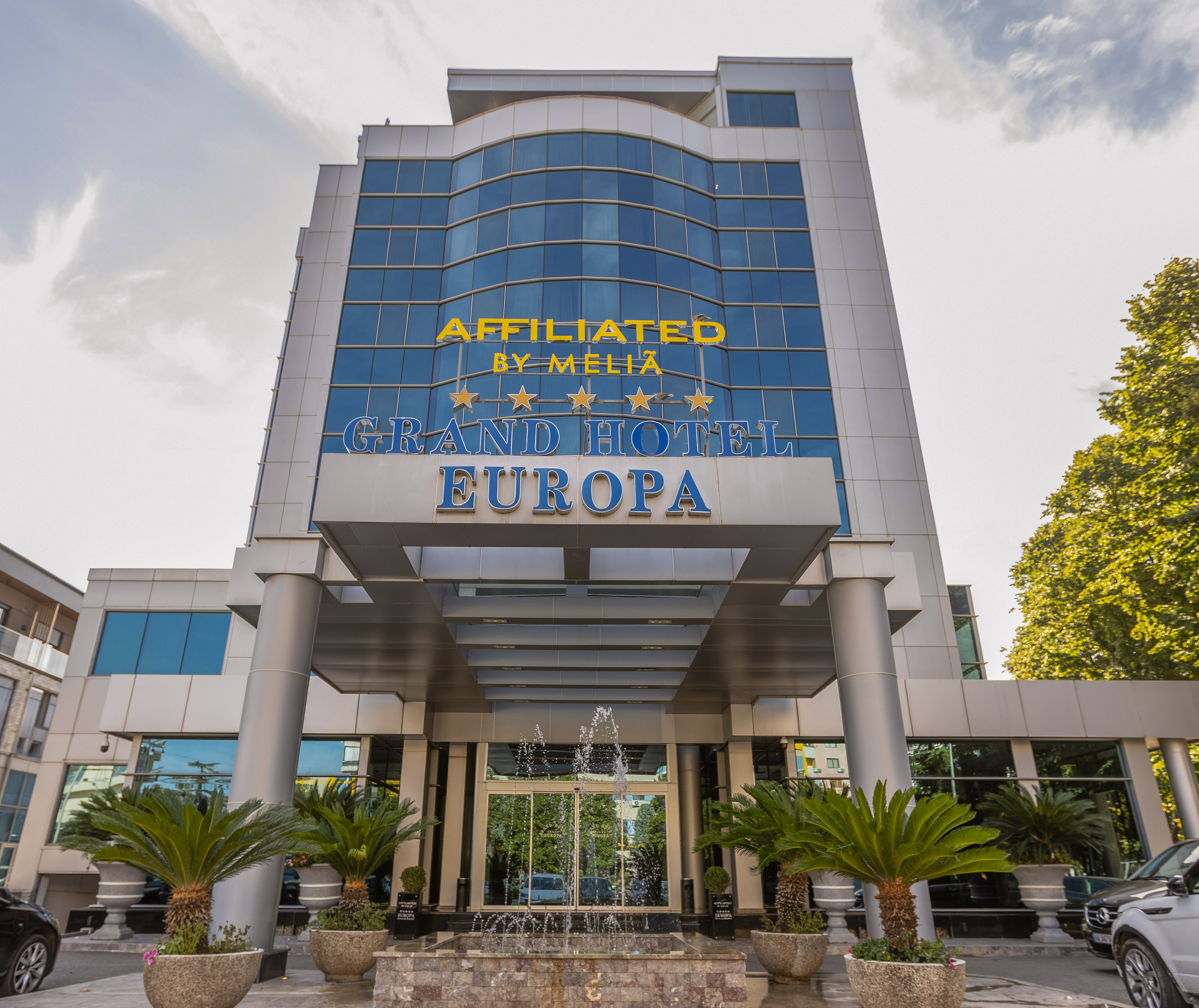 Grand Hotel Europa, Affiliated by Meliá, modern entrance with fountain.