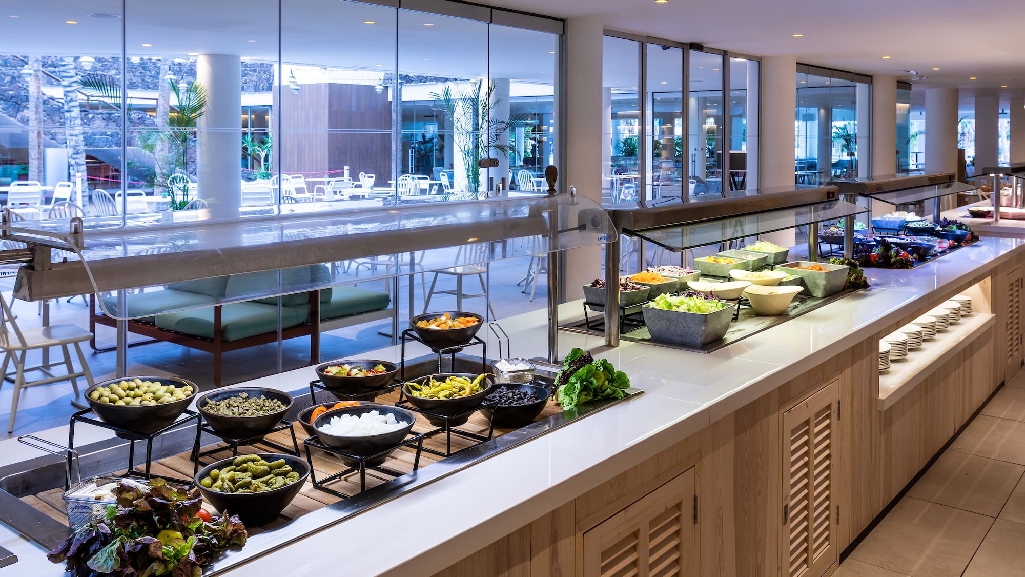 a buffet line with food on it