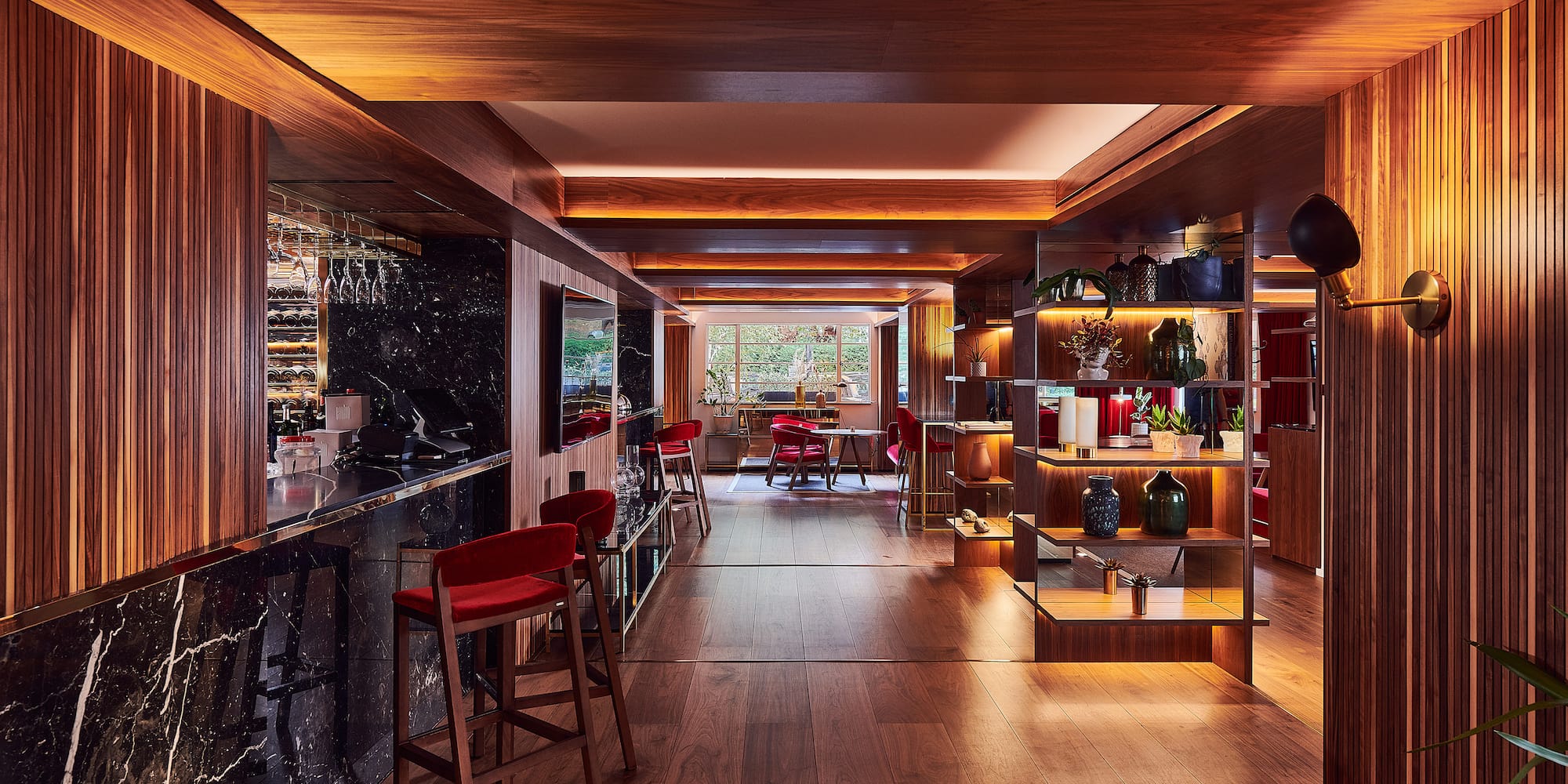 a room with a bar and shelves