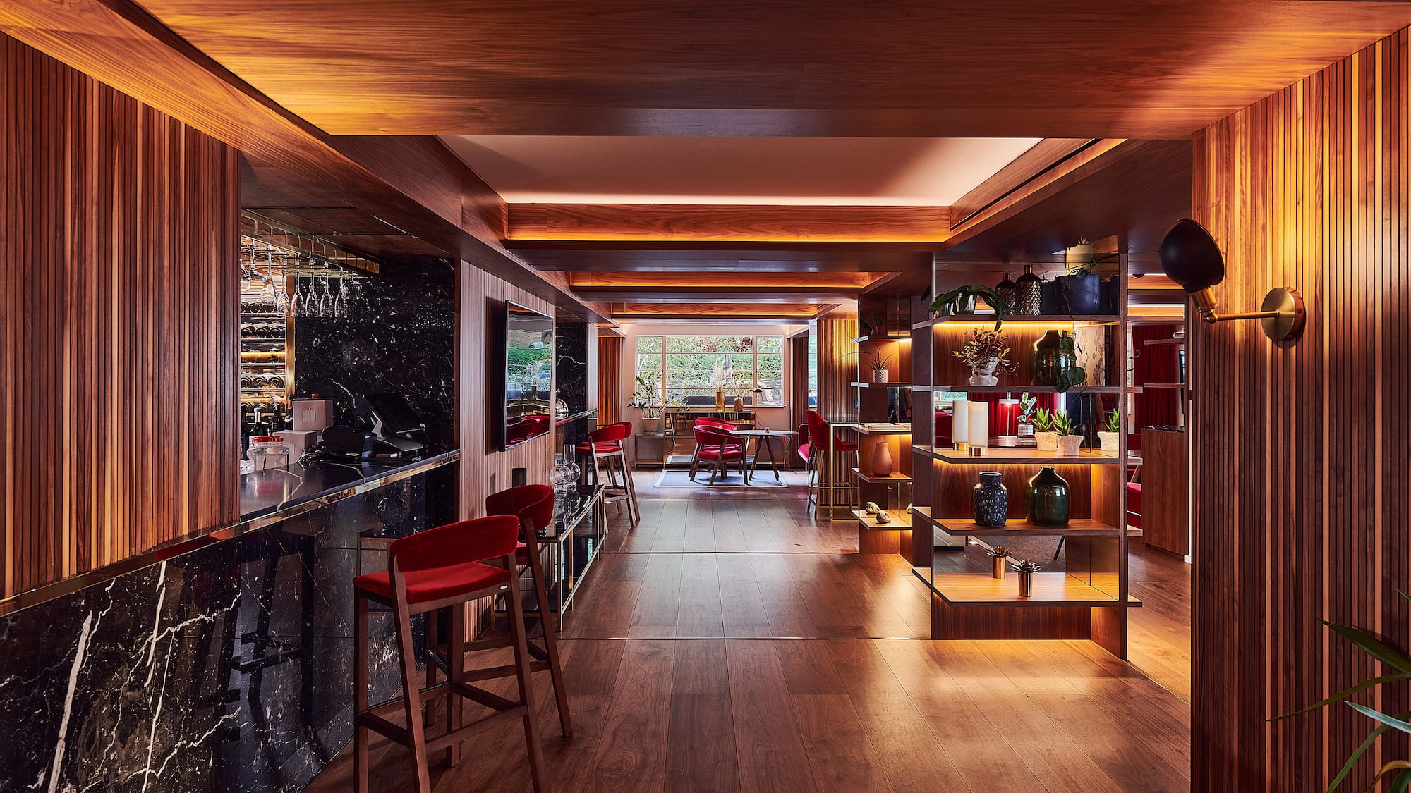 a room with a bar and shelves