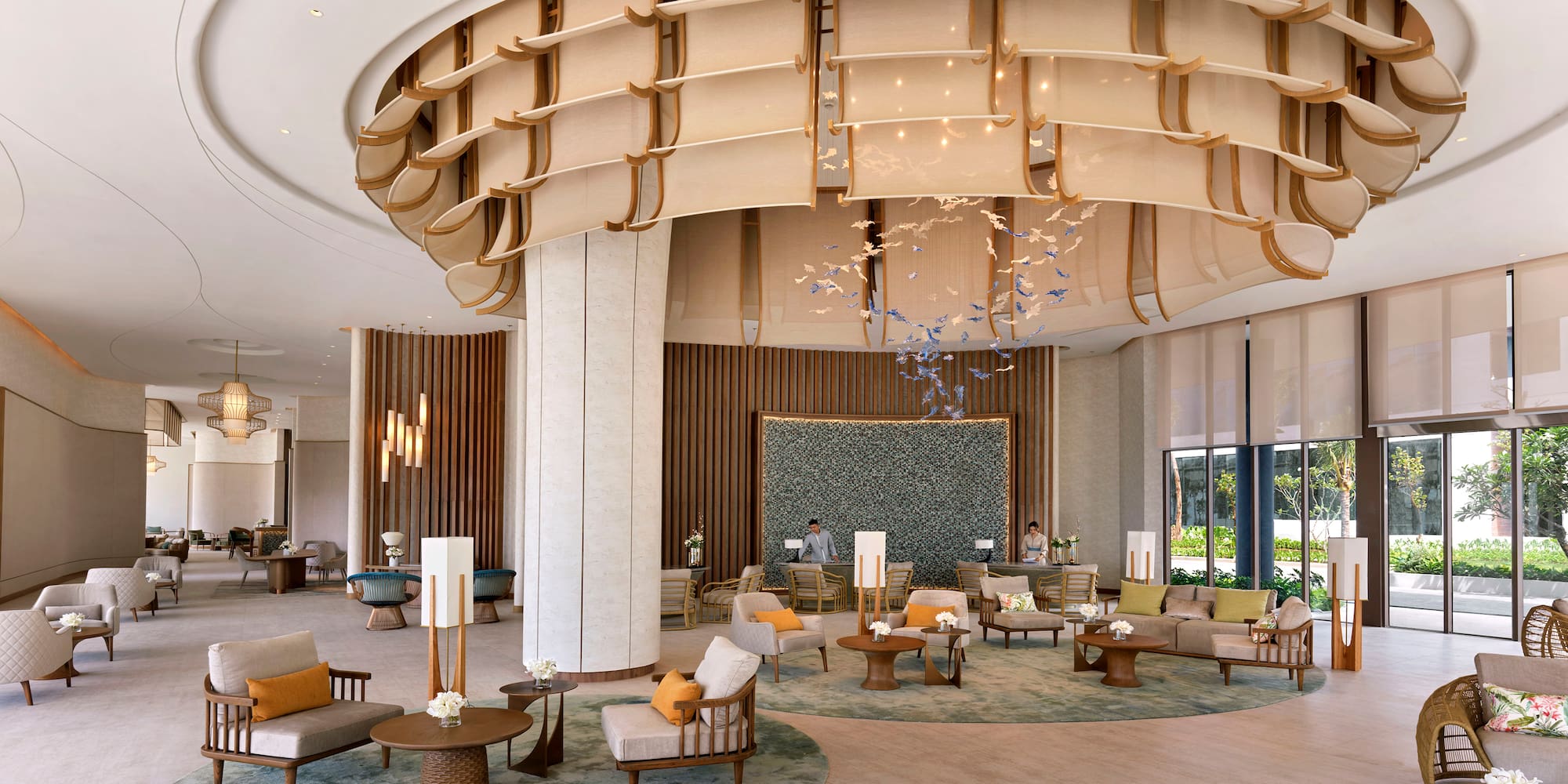 a large lobby with a large round ceiling and a large round table