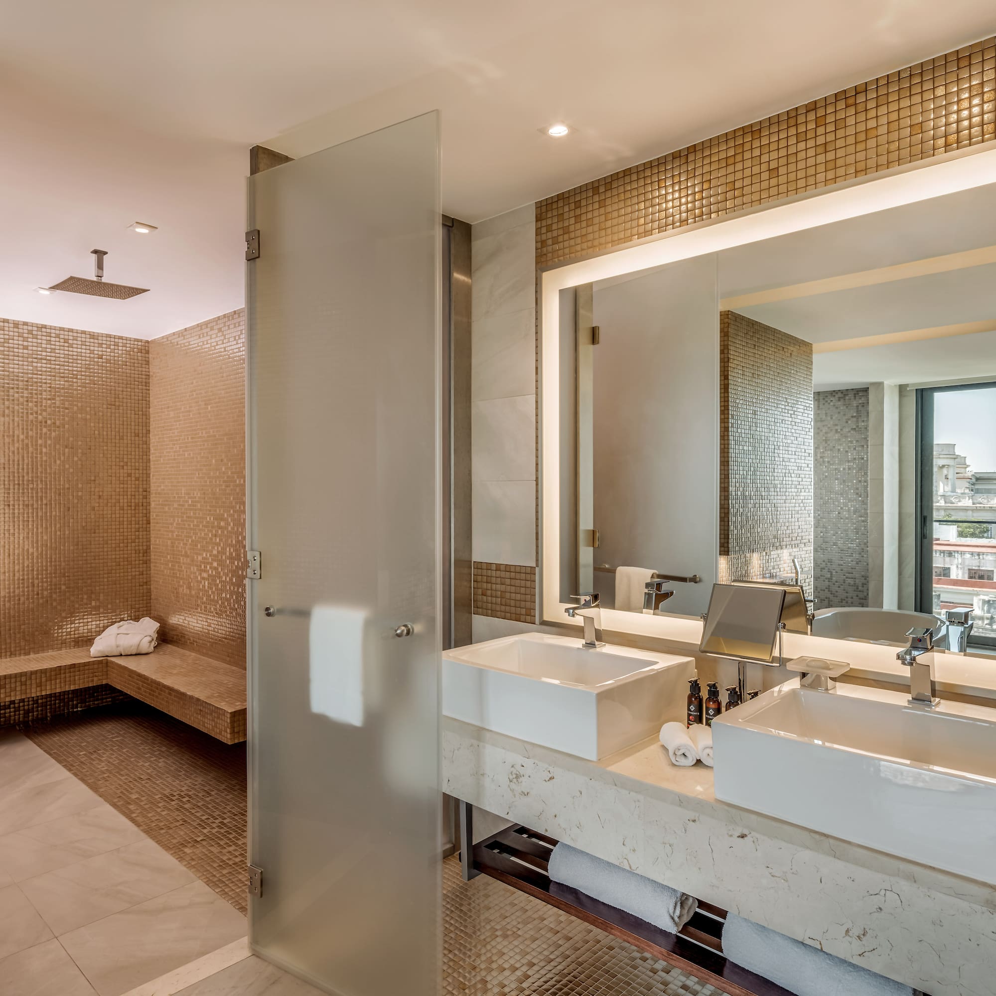 a bathroom with a shower and sink