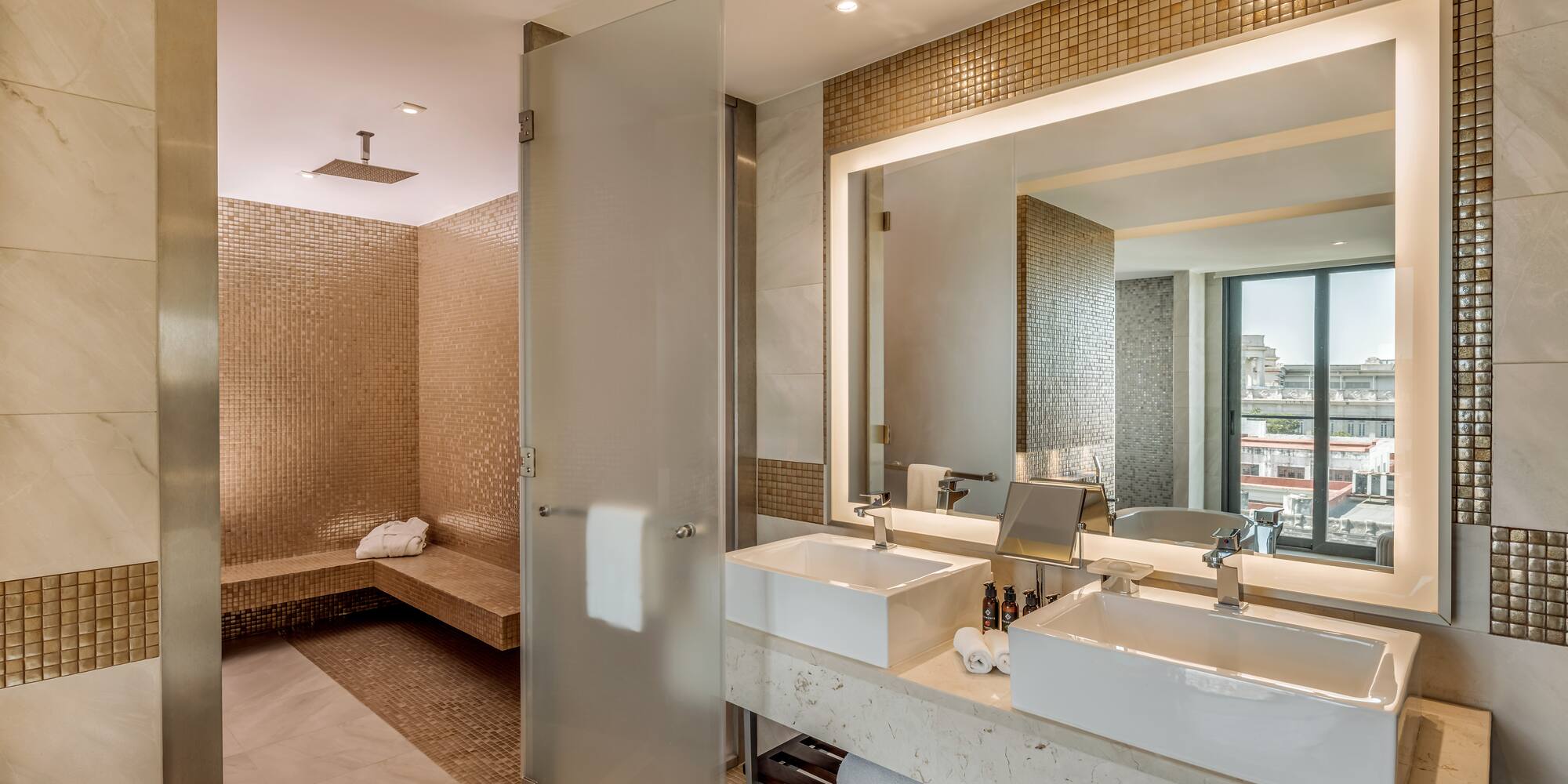 a bathroom with a shower and sink