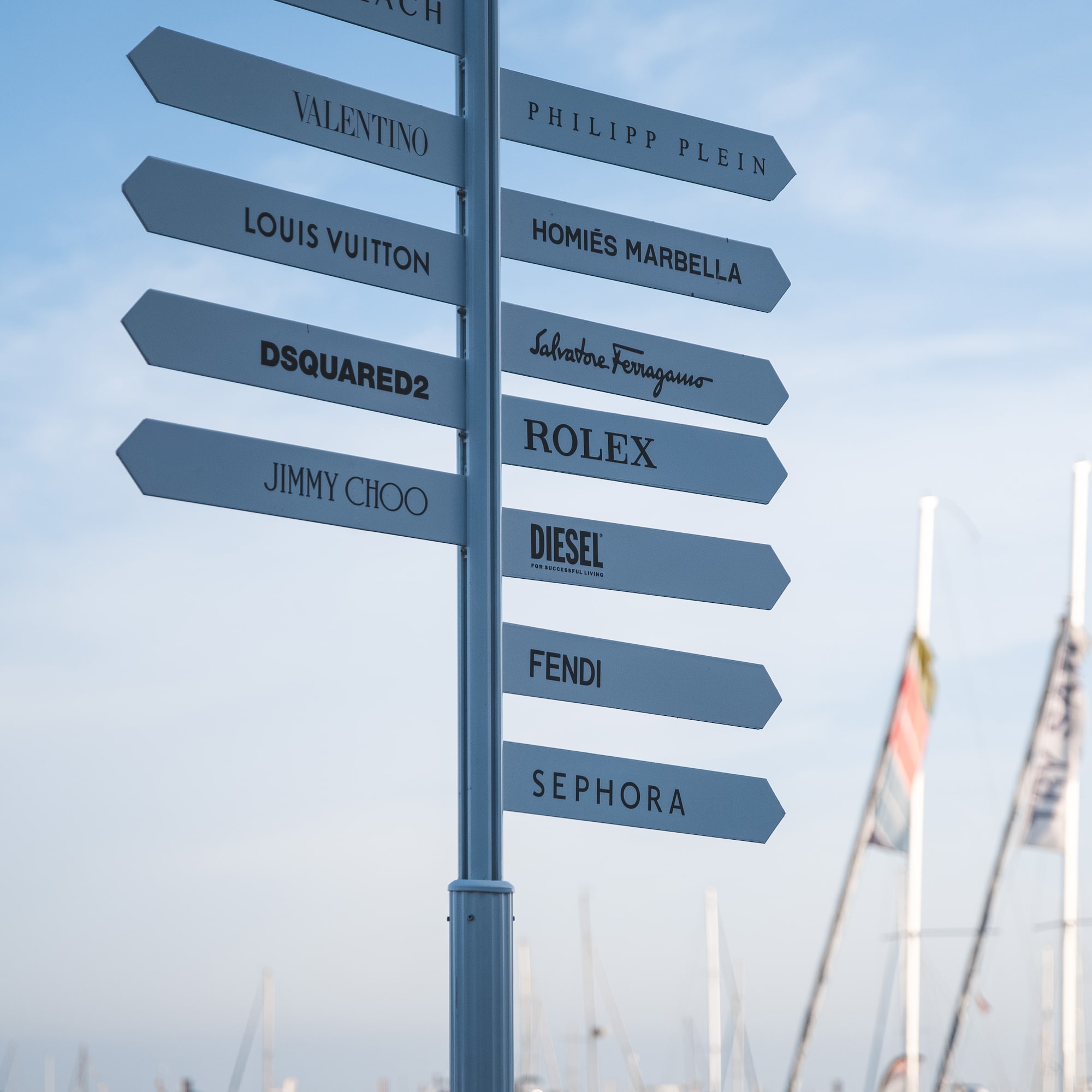 a sign post with many signs