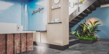 a reception desk in a hotel