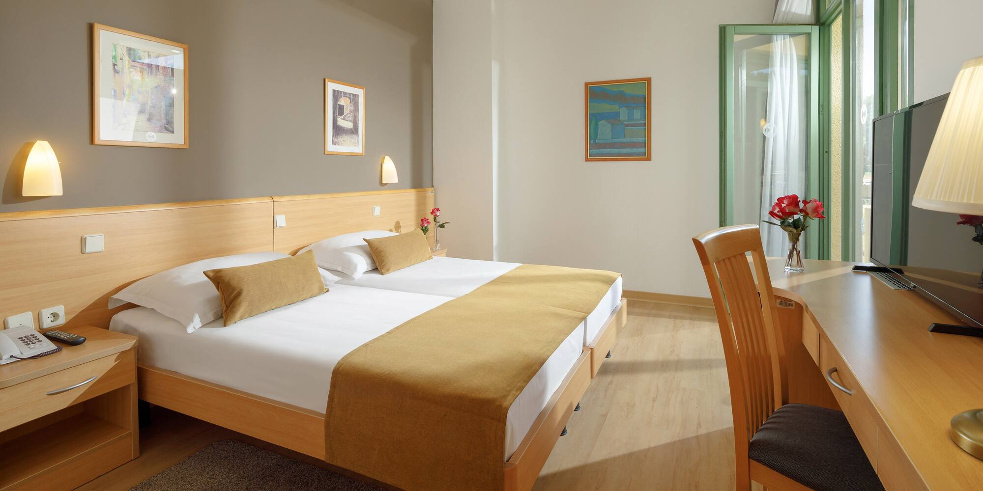 a room with a bed and a desk