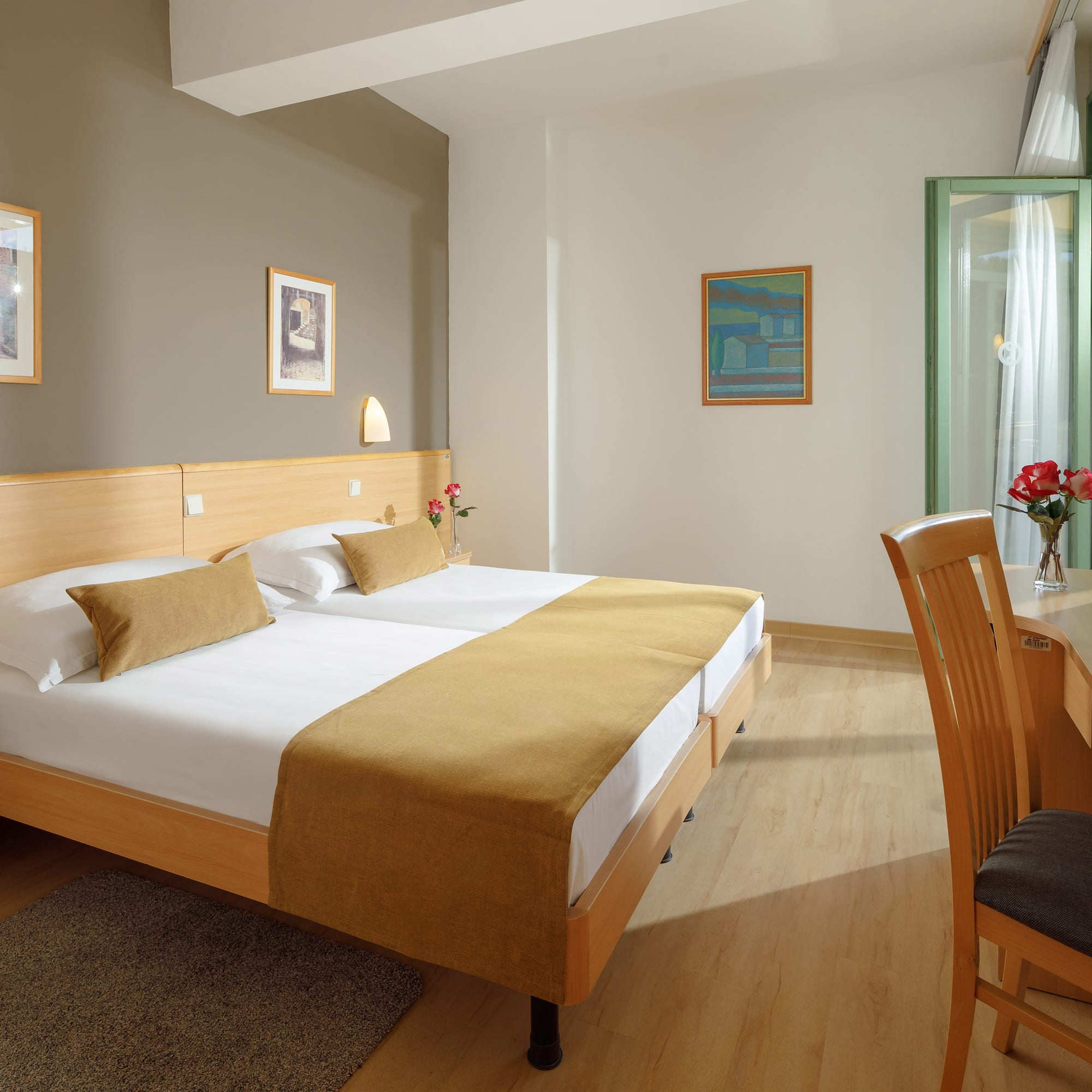 a room with a bed and a desk